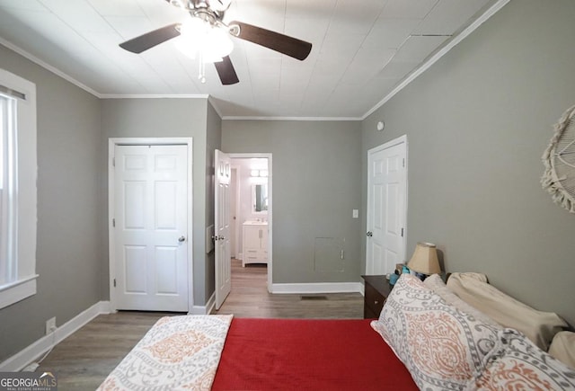 430 Sherwood Cir, Danielsville, GA 30633 - bedroom with wood finished floors, crown molding, and a ceiling fan