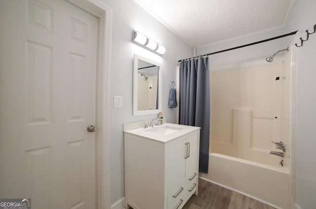 430 Sherwood Cir, Danielsville, GA 30633 - full bathroom featuring vanity, wood finished floors, shower / bathtub combination with curtain, and crown molding