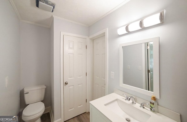 430 Sherwood Cir, Danielsville, GA 30633 - bathroom featuring ornamental molding, vanity, and wood finished floors