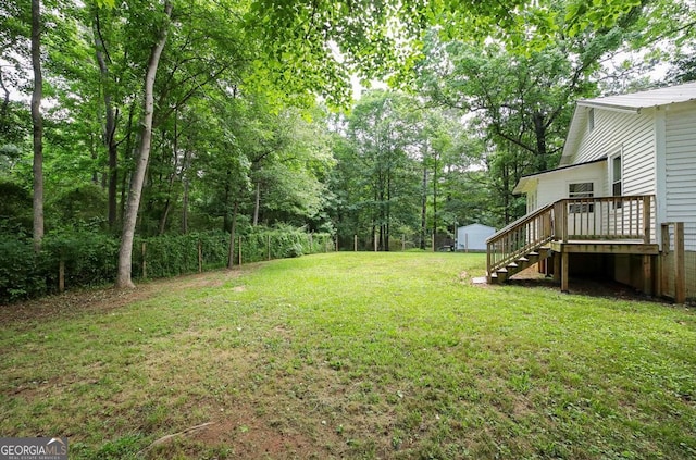 430 Sherwood Cir, Danielsville, GA 30633 - view of green lawn with stairs and a wooden deck