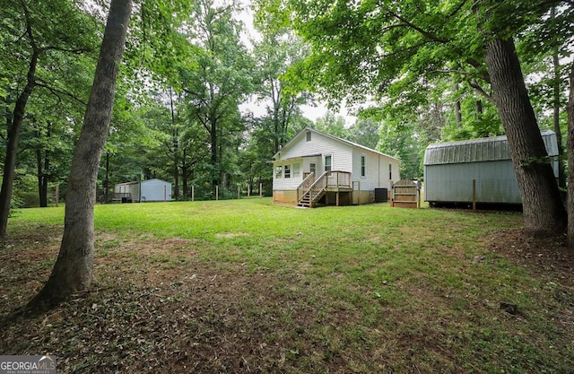 430 Sherwood Cir, Danielsville, GA 30633 - view of green lawn with a shed