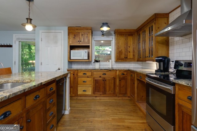3835 Clubhouse Cir, Gainesville, GA 30501 - kitchen with electric stove, wall chimney exhaust hood, white microwave, and brown cabinetry