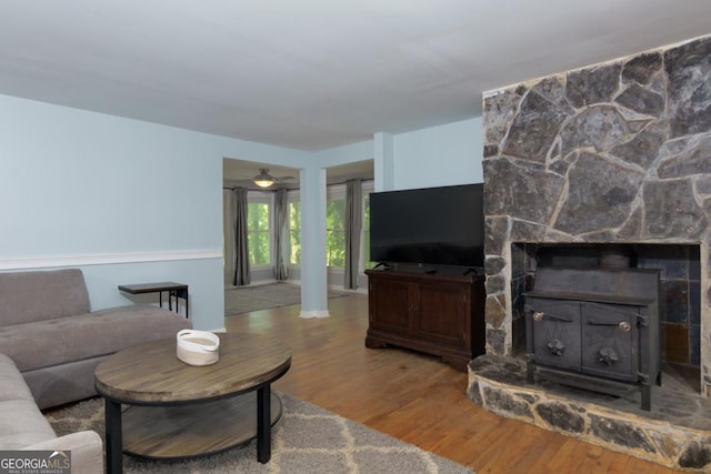 3835 Clubhouse Cir, Gainesville, GA 30501 - living room featuring wood finished floors and a wood stove