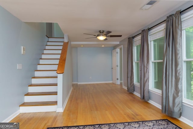 3835 Clubhouse Cir, Gainesville, GA 30501 - entrance foyer with light wood-style floors, stairway, plenty of natural light, and baseboards