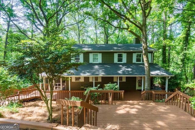 3835 Clubhouse Cir, Gainesville, GA 30501 - rear view of house with a chimney and a wooden deck