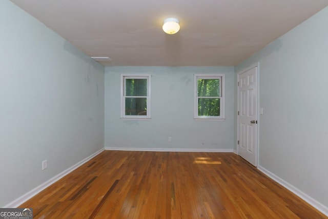 3835 Clubhouse Cir, Gainesville, GA 30501 - empty room with wood finished floors and baseboards