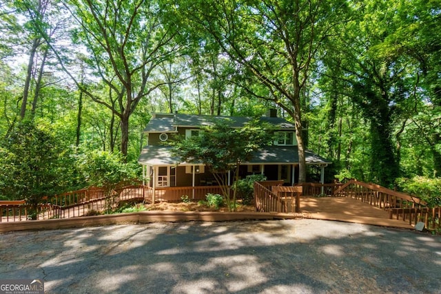 3835 Clubhouse Cir, Gainesville, GA 30501 - view of front facade featuring a wooden deck and covered porch