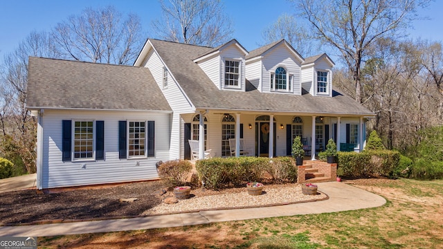 157 Riverbend Cir, Royston, GA 30662 - cape cod-style house featuring covered porch and roof with shingles