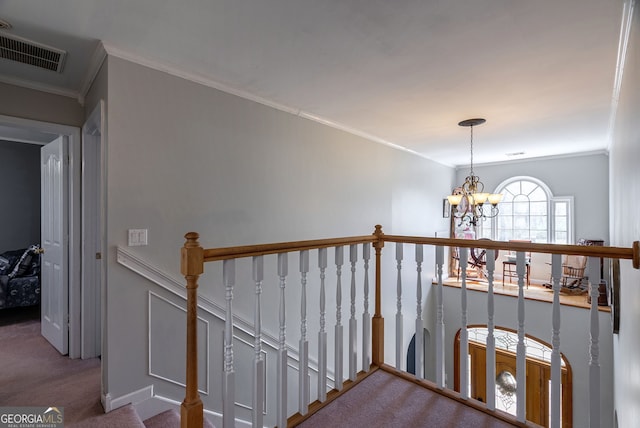 157 Riverbend Cir, Royston, GA 30662 - hall with an upstairs landing, carpet floors, a chandelier, and crown molding