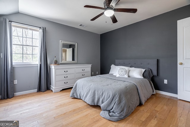 157 Riverbend Cir, Royston, GA 30662 - bedroom featuring light wood-style floors, baseboards, vaulted ceiling, and ceiling fan