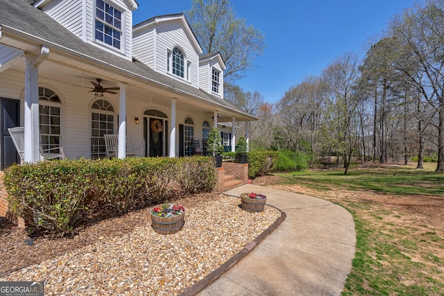 157 Riverbend Cir, Royston, GA 30662 - view of property exterior with covered porch, roof with shingles, and ceiling fan