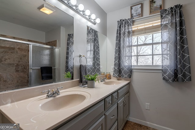 157 Riverbend Cir, Royston, GA 30662 - bathroom with double vanity, a tile shower, and tile patterned floors