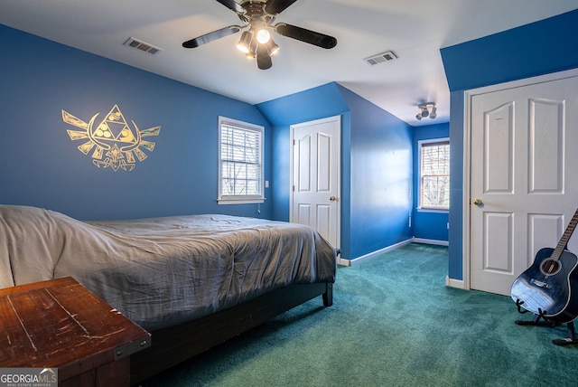 157 Riverbend Cir, Royston, GA 30662 - carpeted bedroom with multiple windows, baseboards, ceiling fan, and lofted ceiling