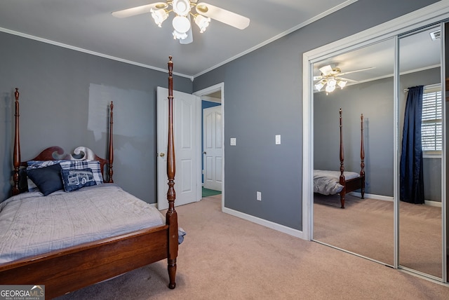 157 Riverbend Cir, Royston, GA 30662 - bedroom featuring a closet, light colored carpet, a ceiling fan, ornamental molding, and baseboards