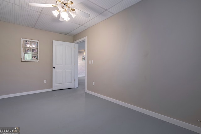157 Riverbend Cir, Royston, GA 30662 - spare room with finished concrete floors, ceiling fan, and baseboards