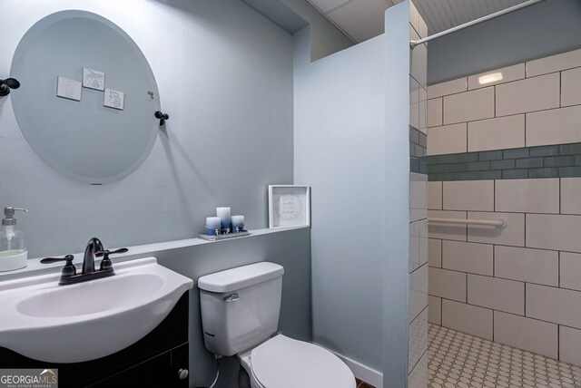 157 Riverbend Cir, Royston, GA 30662 - full bath with toilet, a tile shower, vanity, and tile patterned floors