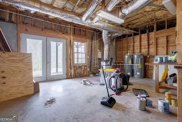 157 Riverbend Cir, Royston, GA 30662 - misc room with water heater, french doors, and concrete flooring