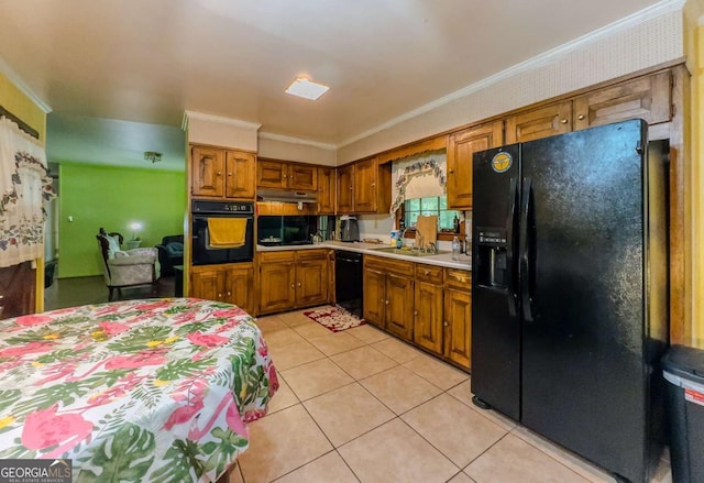 2000 Stone Mountain Lithonia Rd, Lithonia, GA 30058 - kitchen featuring black appliances, under cabinet range hood, brown cabinetry, light tile patterned floors, and ornamental molding