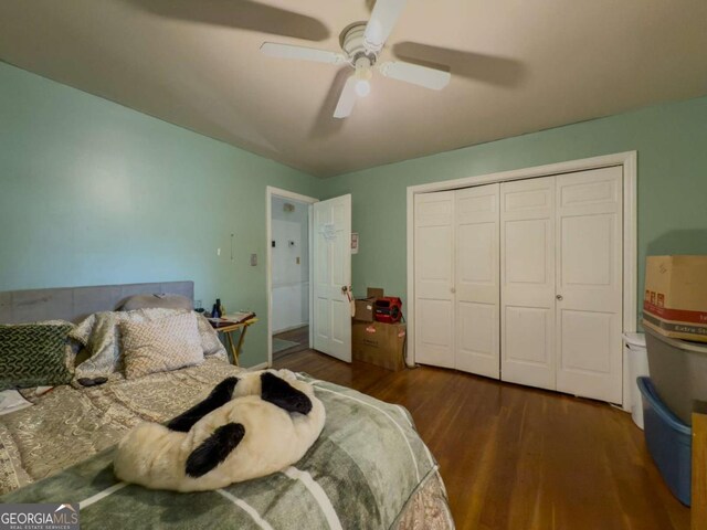 2000 Stone Mountain Lithonia Rd, Lithonia, GA 30058 - bedroom featuring wood finished floors, a closet, and a ceiling fan