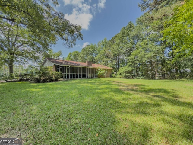 2000 Stone Mountain Lithonia Rd, Lithonia, GA 30058 - view of green lawn featuring a sunroom