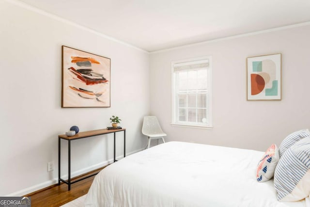 936 Ormewood Ter SE, Atlanta, GA 30316 - bedroom featuring ornamental molding, wood finished floors, and baseboards