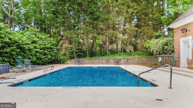 3532 Paces Pl NW, Atlanta, GA 30327 - community pool featuring a patio area