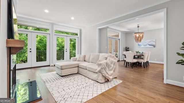 3532 Paces Pl NW, Atlanta, GA 30327 - living area with french doors, a chandelier, wood finished floors, and recessed lighting