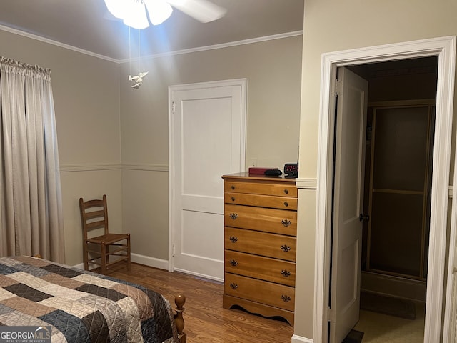608 4th Ave SW, Thomaston, GA 30286 - bedroom featuring dark wood finished floors and ornamental molding