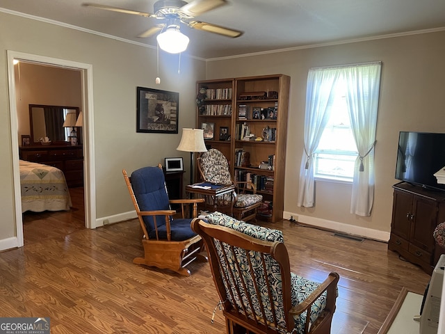 608 4th Ave SW, Thomaston, GA 30286 - home office with ceiling fan, crown molding, baseboards, and wood finished floors