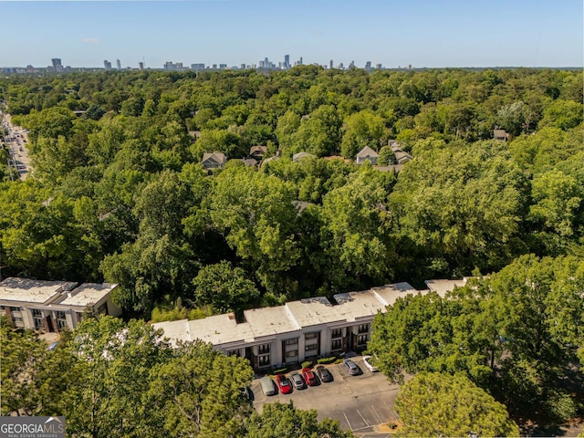1445 Monroe Dr NE Unit C13, Atlanta, GA 30324 - aerial view of a forest and city skyline