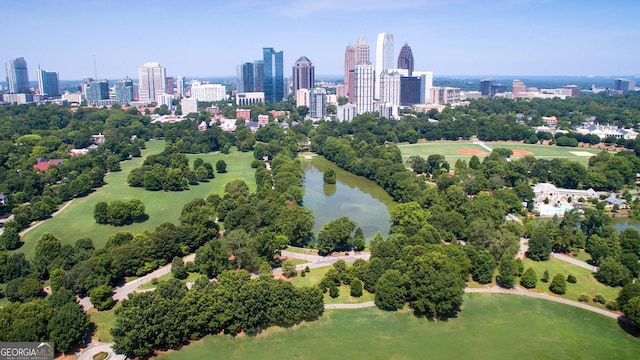 1445 Monroe Dr NE Unit C13, Atlanta, GA 30324 - drone / aerial view of skyline and a nearby body of water