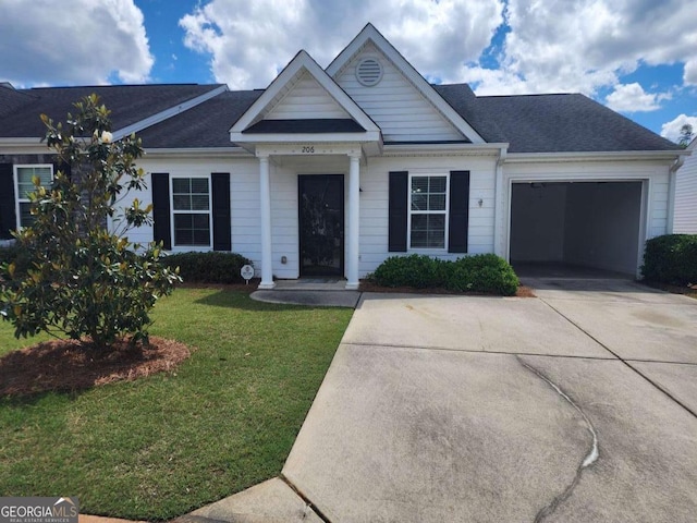 206 York Way, Augusta, GA 30909 - view of front facade with a garage, driveway, and a front yard