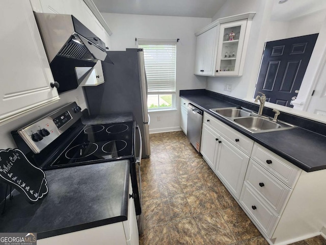 206 York Way, Augusta, GA 30909 - kitchen with appliances with stainless steel finishes, a sink, dark countertops, stone finish flooring, and white cabinets