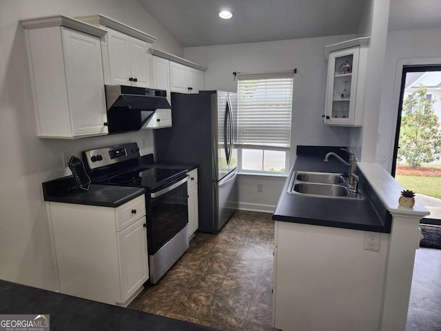 206 York Way, Augusta, GA 30909 - kitchen featuring stainless steel electric range, a sink, dark countertops, healthy amount of natural light, and vaulted ceiling