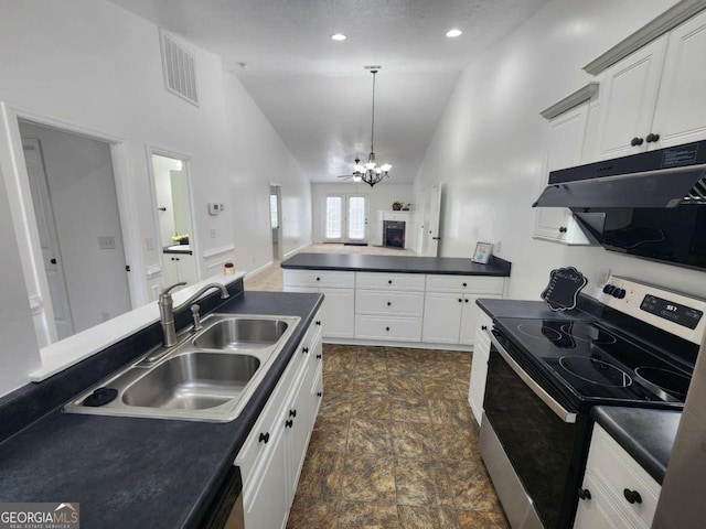 206 York Way, Augusta, GA 30909 - kitchen featuring electric stove, dark countertops, a chandelier, a peninsula, and a sink