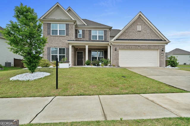 2910 Waverly Walk Pt, Cumming, GA 30041 - view of front of house featuring brick siding, concrete driveway, a front yard, central air condition unit, and a garage