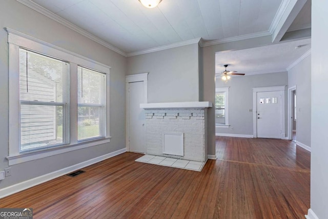 3361 Myrtle St, Atlanta, GA 30354 - unfurnished living room featuring wood-type flooring, ceiling fan, a fireplace, and crown molding
