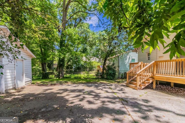 3361 Myrtle St, Atlanta, GA 30354 - view of yard featuring a wooden deck and a patio area
