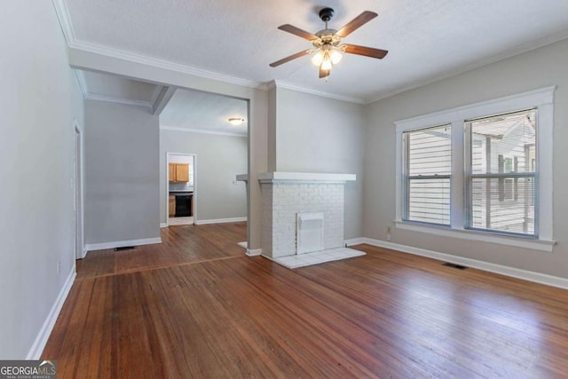 3361 Myrtle St, Atlanta, GA 30354 - unfurnished living room featuring wood finished floors, a ceiling fan, crown molding, and a fireplace