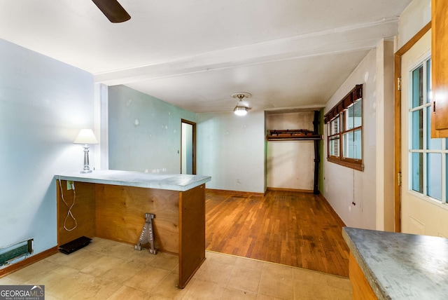 511 Oakview Rd, Decatur, GA 30030 - kitchen with baseboards, ceiling fan, and a peninsula
