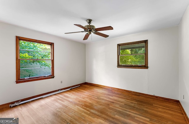 511 Oakview Rd, Decatur, GA 30030 - spare room with light wood-style floors, baseboards, and a ceiling fan