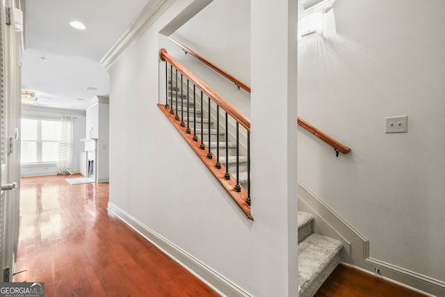 1199 Lavista Rd NE, Atlanta, GA 30324 - stairs with ornamental molding, hardwood / wood-style floors, baseboards, recessed lighting, and ceiling fan