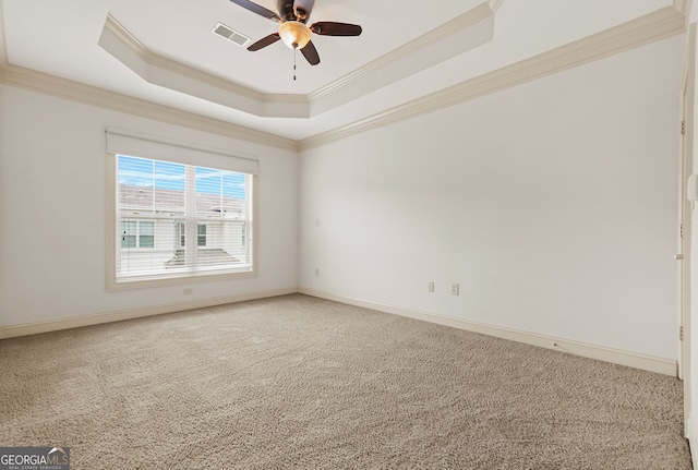 1199 Lavista Rd NE, Atlanta, GA 30324 - spare room with a tray ceiling, crown molding, ceiling fan, and light colored carpet