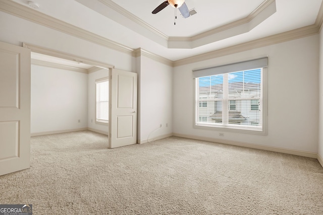 1199 Lavista Rd NE, Atlanta, GA 30324 - unfurnished room featuring healthy amount of natural light, crown molding, a tray ceiling, carpet floors, and ceiling fan