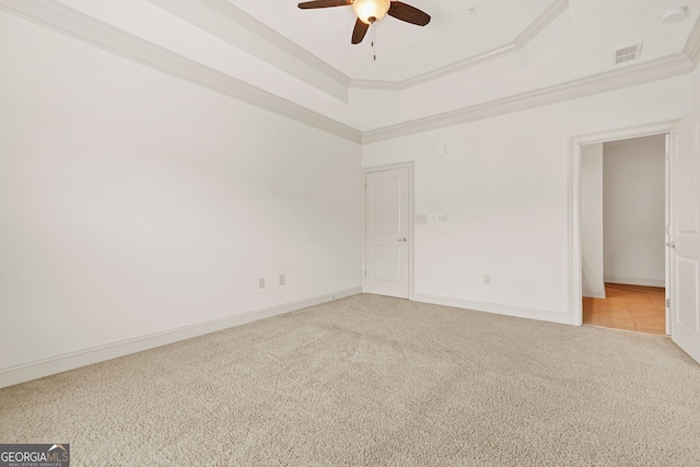 1199 Lavista Rd NE, Atlanta, GA 30324 - unfurnished room with light carpet, a ceiling fan, ornamental molding, a tray ceiling, and baseboards