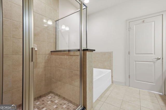 1199 Lavista Rd NE, Atlanta, GA 30324 - full bath featuring tile patterned floors, a bath, and a shower stall