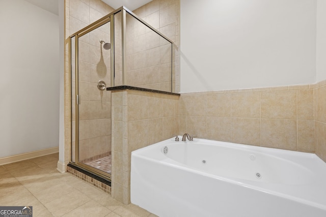 1199 Lavista Rd NE, Atlanta, GA 30324 - full bath with a jetted tub, a stall shower, and tile patterned flooring