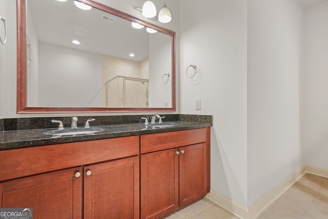 1199 Lavista Rd NE, Atlanta, GA 30324 - full bathroom with double vanity, tiled shower, baseboards, tile patterned floors, and recessed lighting
