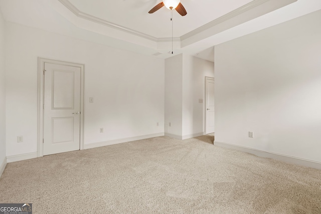 1199 Lavista Rd NE, Atlanta, GA 30324 - unfurnished room with ceiling fan, light colored carpet, a raised ceiling, and baseboards