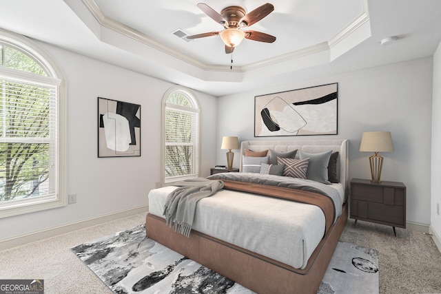1199 Lavista Rd NE, Atlanta, GA 30324 - carpeted bedroom with crown molding, a raised ceiling, multiple windows, and ceiling fan